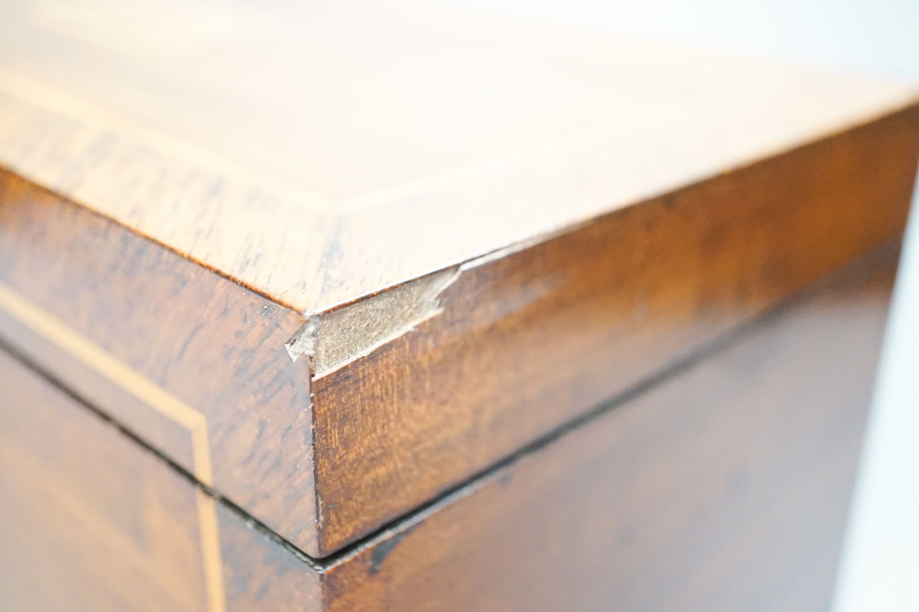 An aneroid barometer in circular polished oak surround and a banded and inlaid two section tea casket, 30.5 x 16.5cm